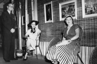 Black and white photo of DAVENPORT, Arthur. Brian and Marjorie Johnstone with Margaret Olley at The Johnstone Gallery in the basement of the Brisbane Arcade.