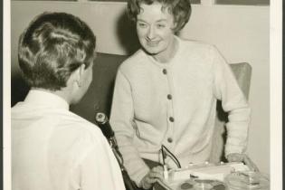 Hazel de Berg with her tape recorder, interviewing Michael Terry, 1964.