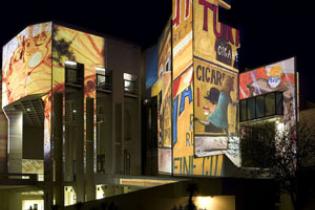 The National Gallery of Australia with works from the collection projected on the outer walls for its 25th anniversary in 2007